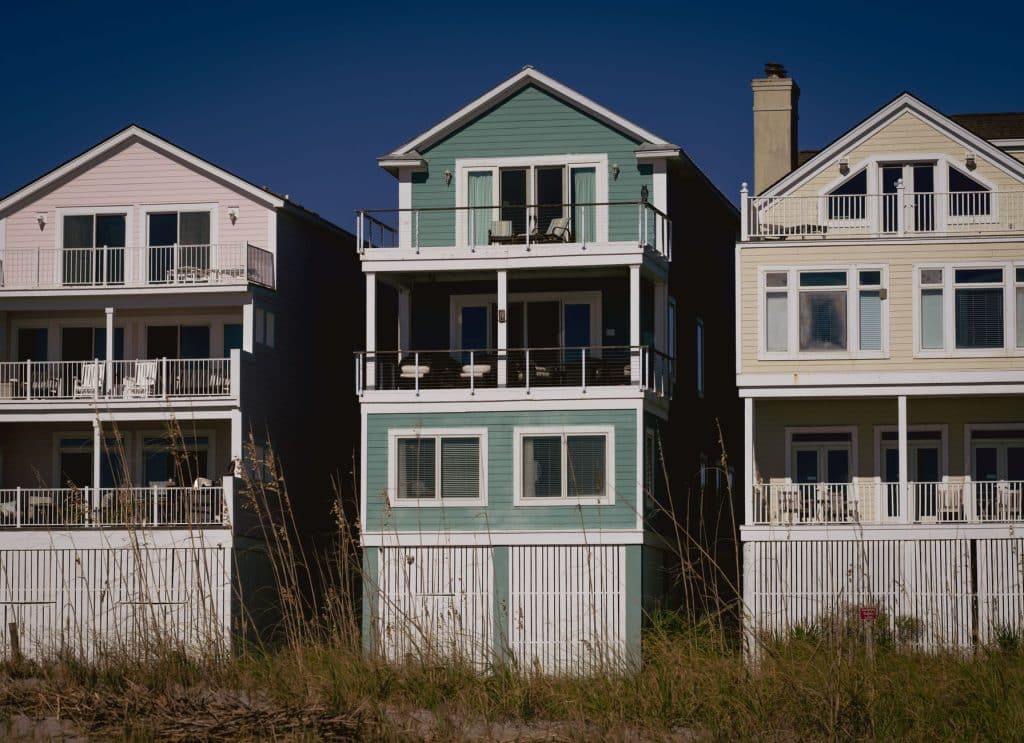 Raised New Orleans home on piers with newly installed lap siding